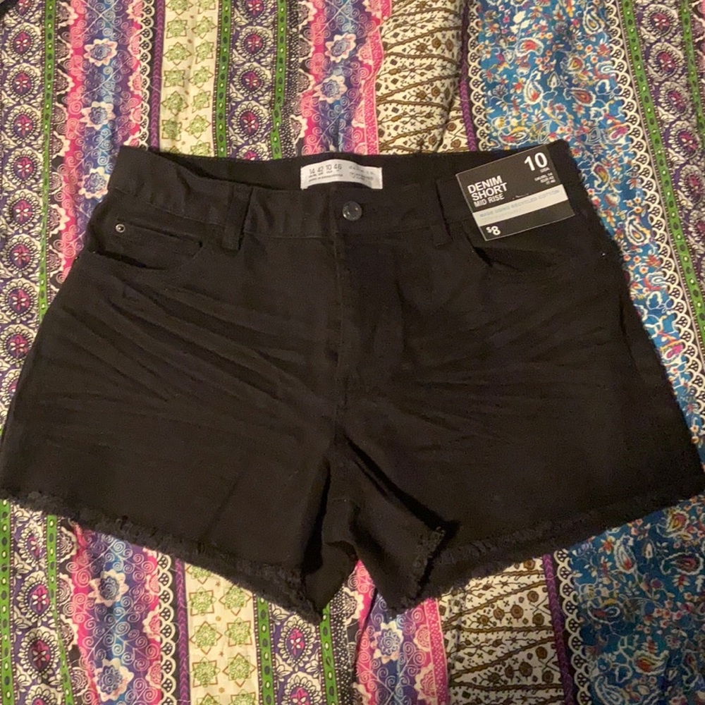 Black denim shorts mid rise.  Size 10 in the USA.